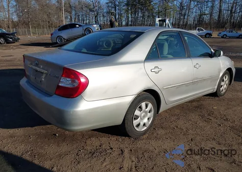 2004 Toyota Camry Le z USA, uszkodzony, nr VIN 4T1BE32K24U314110